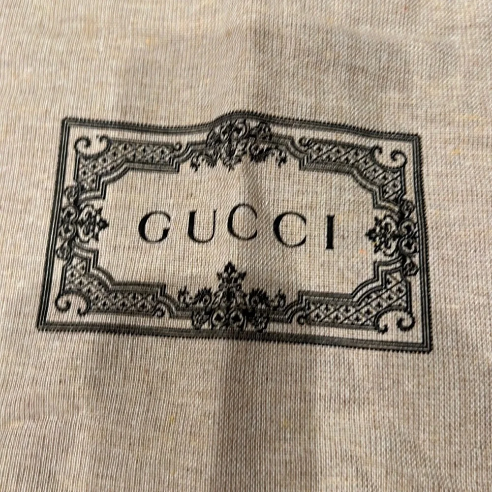 Gucci dust/garment bag.